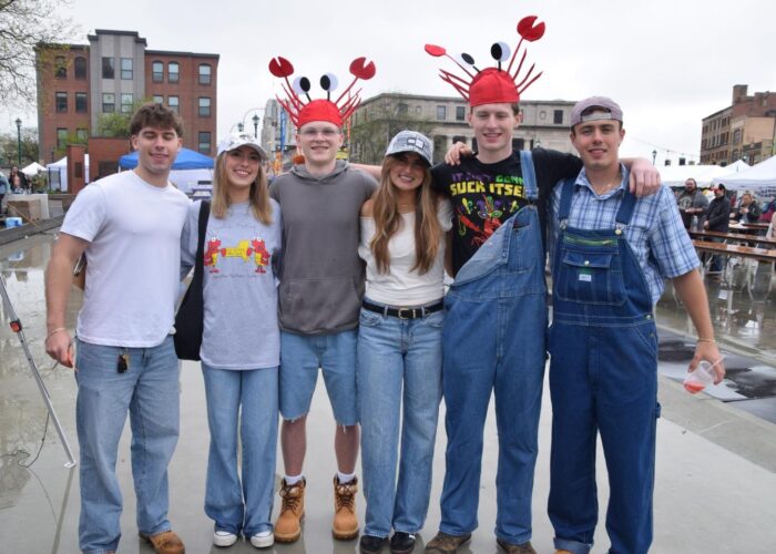 teenage friends posing at the festival