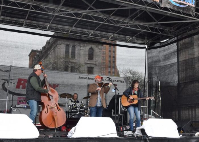 a band performing on the main stage
