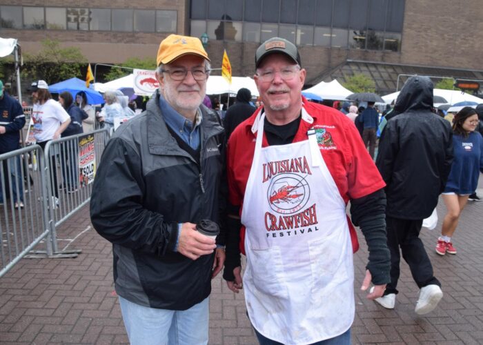 two volunteers posing for a photo
