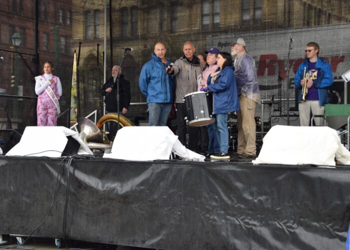 presenters speaking on the main stage